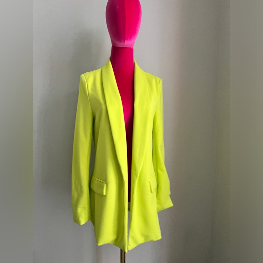 Bright yellow/green blazer. No buttons or zipper. Only worn 1 time. MSRP $35